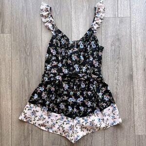 Altar’d State Women’s Floral Ruffle Romper with Flutter Straps Black Blue Large